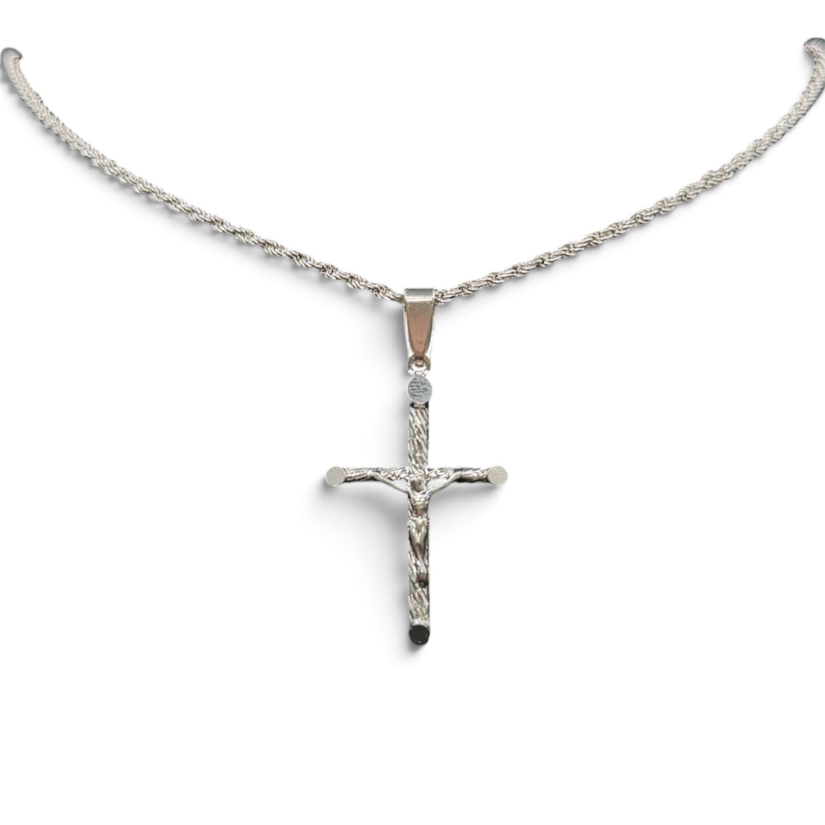 Dije de crucifijo